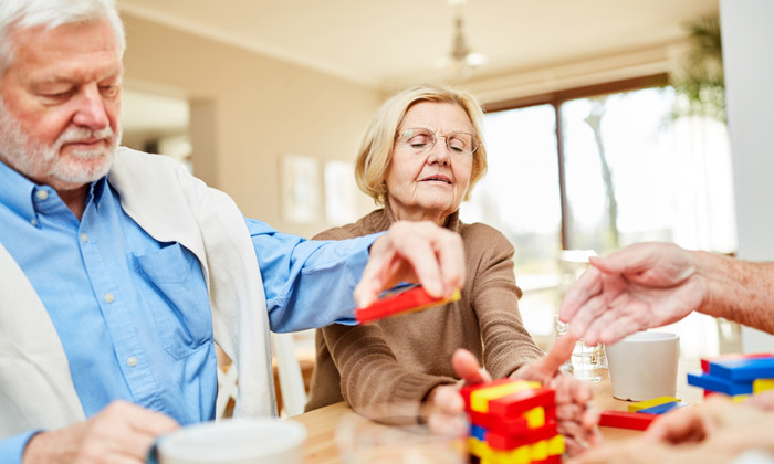 grandparents playing with grandchildren