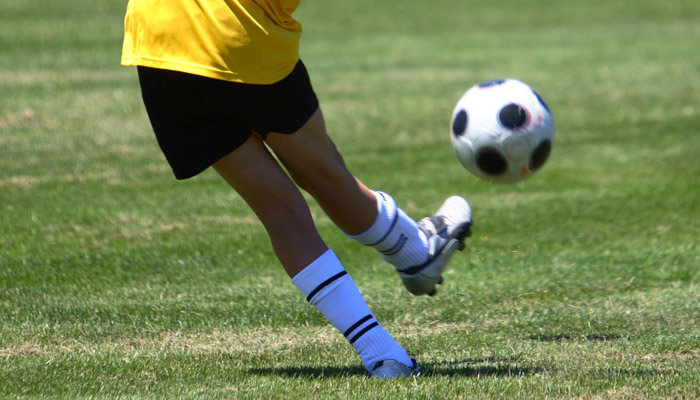 soccer player spraining ankle
